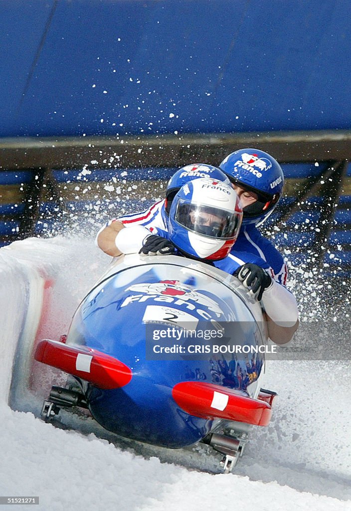 France's bobsleigh pilot Bruno Thomas and his teammates Michel Andre