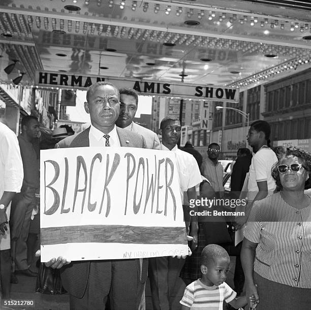 New York, NY- Floyd B. McKissick, national director of the Congress of Racial Equality , carries a sign reading "Black Power" after joining a picket...