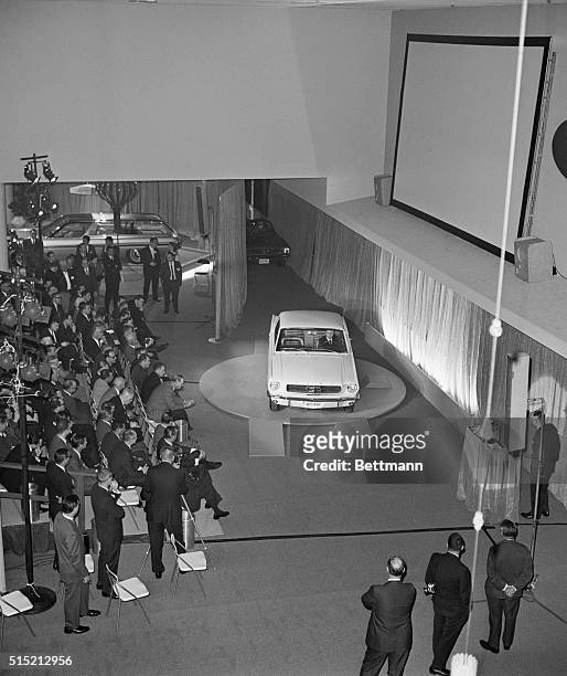 The Ford Company unveils the new Mustang to the press at the World's Fair in New York.