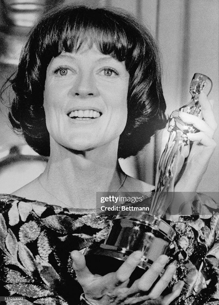 Maggie Smith Holds Oscar Award