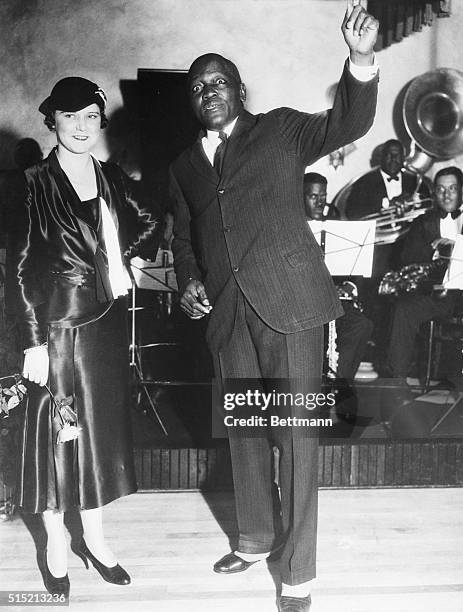 Los Angeles, CA- Portrait of Jack Johnson introducing his fourth wife, the former Mrs. Irene Pineau, at the opening of his new nightclub. The couple...