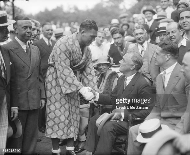 Kingston, NY - Governor Franklin D. Woosevelt of New York, shaking hands with Max Schmeling, the World's Heavyweight Boxing Champion, during the...