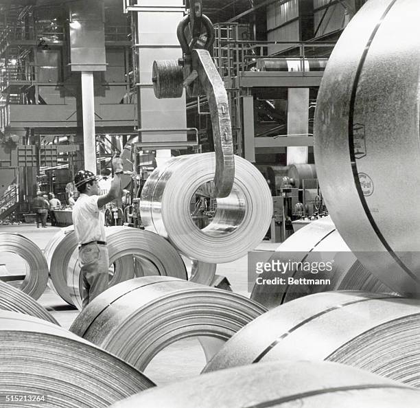 Lackawanna, NY - Finished coils of galvanized sheet steel are being removed from storage area at Bethlehem Steel Corporation's Lackawanna, NY, plant....