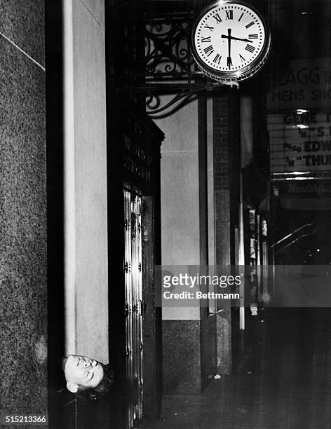 New York, NY- As is true of so many Weegee photos, this one needs no caption. This fellow is sleeping in a bank window on 42nd Street, a few steps...