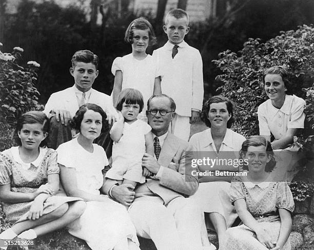 Joseph and Rose Kennedy pose with eight of their children. Front Row , Patricia, Rose and Joseph Kennedy, with baby Edward, Rosemary, Eunice, and...