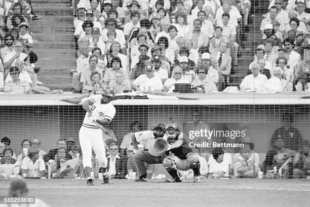 Los Angeles, California: Cincinnati's Ken Griffey is into his swing as he belts a 5th inning home run off Tommy John of the Yankees, for the National...