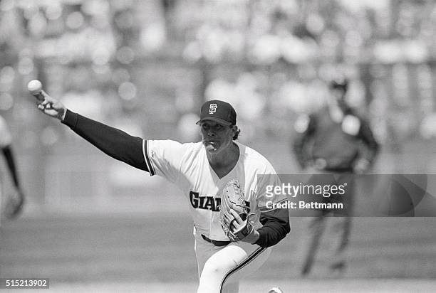 San Francisco, CA- Giants' relief pitcher Rich "Goose" Gossage, making his first appearance for his new team, unloads a pitch during the first game...