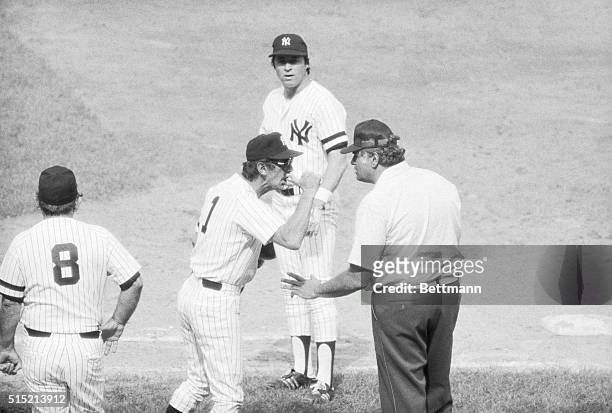New York, NY - Umpire Ron Luciano is told where he can go by Yankee manager Billy Martin during dispute in fifth inning 9/2 over a fair-foul ball...