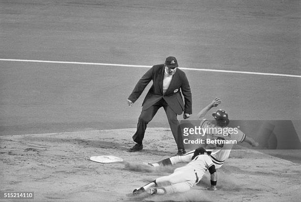 Kansas City - Kansas City's Pete LaCock slides past a diving Bucky Dent to steal 2nd during the 2nd inning in the American League playoff 10/3 in...