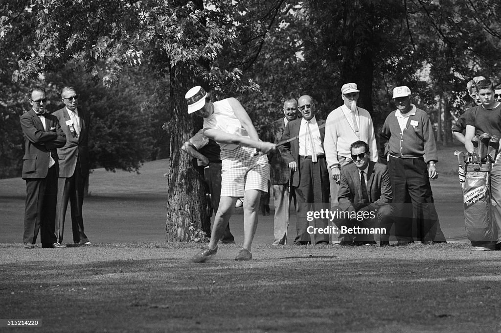 Golfer Betsy Rawls Swinging Club