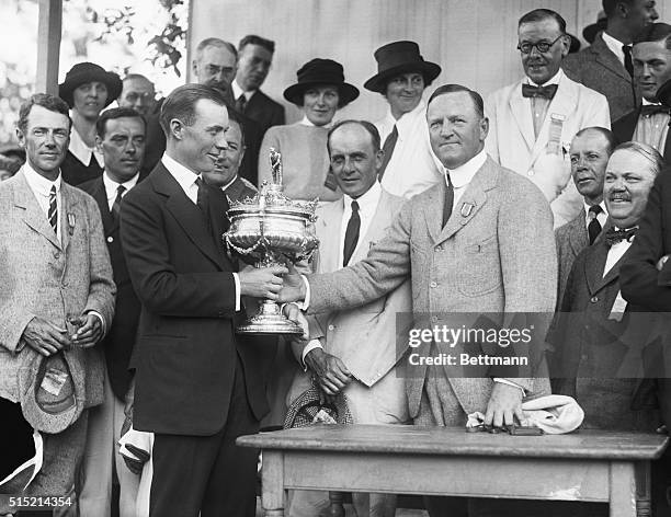 Roslyn, NY- George Herbert Walker , President of the American Golf Association presenting the National Amateur Trophy to Charles "Chick" Evans.