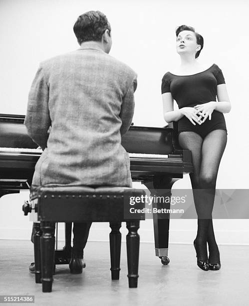 Hollywood, California- Singer Judy Garland practices some of her numbers as she rehearses for her second television appearance on the "GE Theater,"...