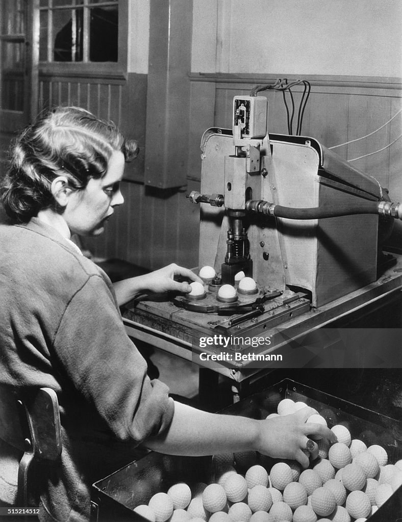 Woman Operates "Rabbit Golf Ball" Machine