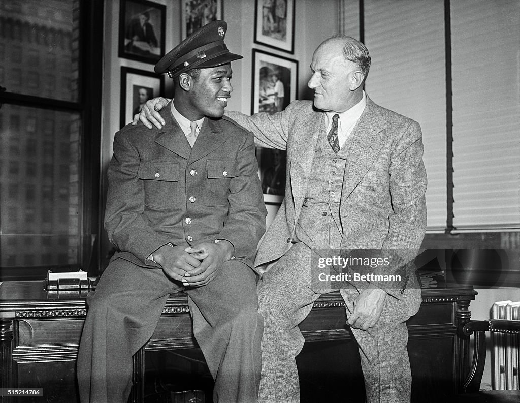 Boxer Sugar Ray Robinson with Promoter Mike Jacobs