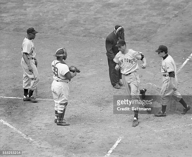 New York, NY- Giants' Bobby Thomson sails across home plate after hitting a 2-2 pitch deep into the lower left field stands for a homer, scoring...