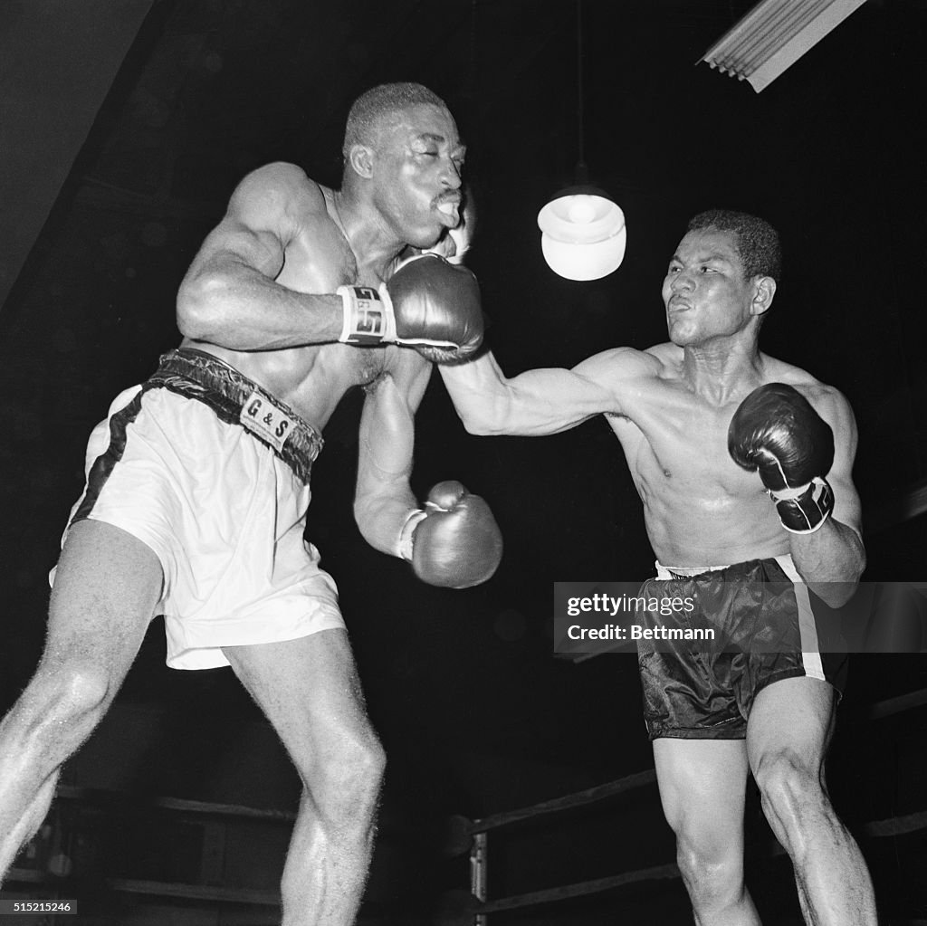 New York, NY- Randy Sandy , of New York, takes a hard right from ...