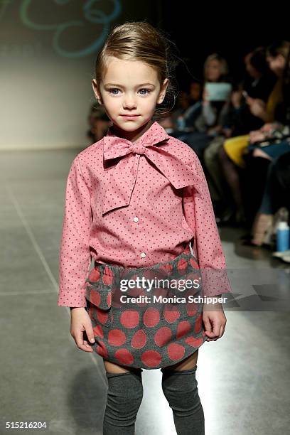 Model, wearing Baby CZ by Carolina Zapf, walks the runway at petitePARADE / Kids Fashion Week, NYC on March 12, 2016 in New York City.