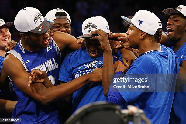 Isaiah Whitehead of the Seton Hall Pirates is mobbed by his teammates after winning the MVP during the Big East Basketball Tournament Championship at...