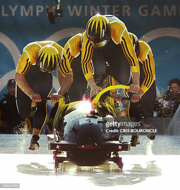 Ranked 1st in 2001-02 World Cup four-man rankings, Swiss bobsleigh pilot Martin Annen and his teammates Silvio Schaufelberger, Beat Hefti and Cedric...