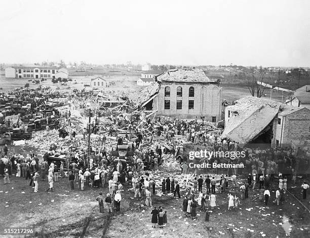 New London, Texas- Photo shows a general view of the rescue workers as they were searching through the wreckage of the rural school at New London,...