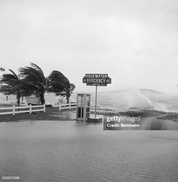 Miami, FL- Thirty-fourth Street becomes part of Biscayne Bay as winds from Hurricane Donna push the waters into downtown Miami. The 36th Street...