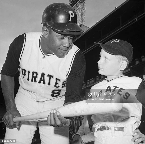 Pittsburgh, Pennsylvania- Pirate slugger Willie Stargell gives some tips on batting to eight-year-old Billy McVicker of Turlte Creek, PA, prior to...