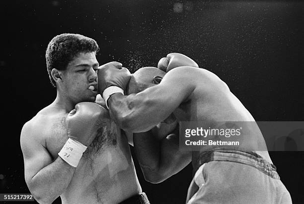 Atlantic City, New JerseyFormer heavyweight champion George Foreman rocks Carlos Hernandez in the fourth round of their fight in the last flurry...