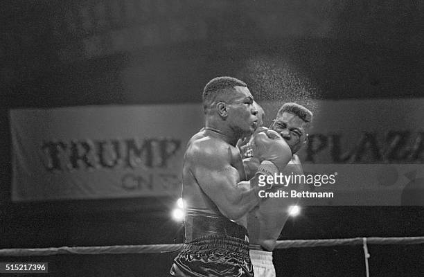 Atlantic City, New JerseyMike Tyson lands a knockout punch in the seventh round on Tyrell Biggs to keep his heavyweight title.