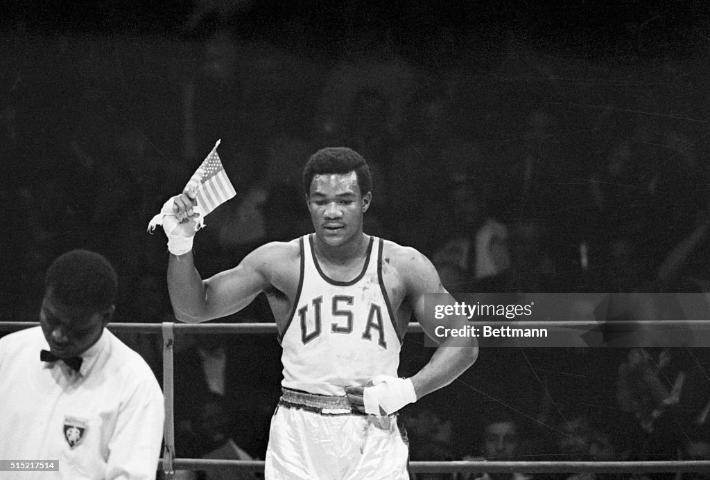 George Foreman Waves US Flag at Olympic Games