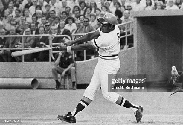Pittsburgh, Pennsylvania- The booming bat of Pirate left fielder Willie Stargell connects with his 26th home run of the season. The home run also...