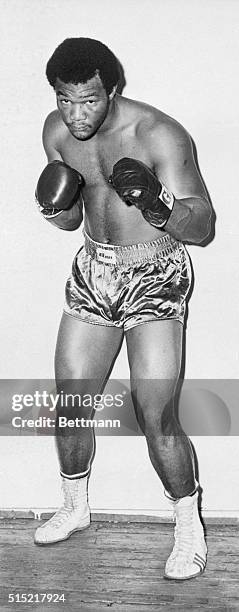 George Foreman striking a fighting pose.