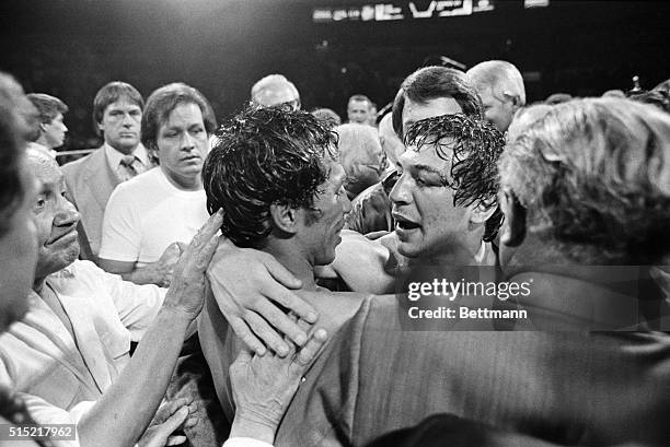 New York, NY- World Boxing Association champion Ray "Boom Boom" Mancini hugs challenger Orlando Romero of Peru, after Mancini knocked out Romero in...