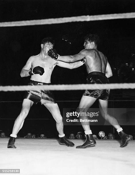 Jimmy Braddock winning a championship match with Max Baer in 1935.