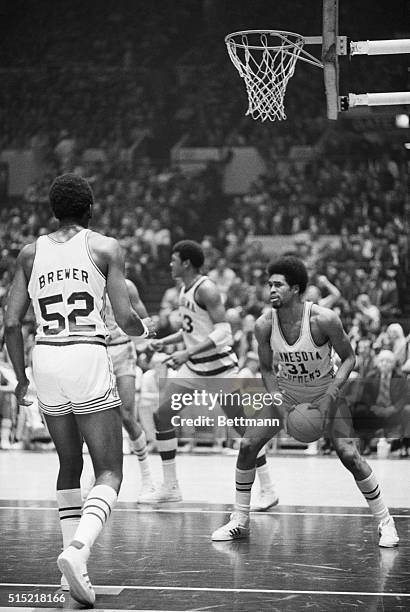 New York, New York-Dave Winfield , Minnesota, grabs rebound in NIT game against Alabama.