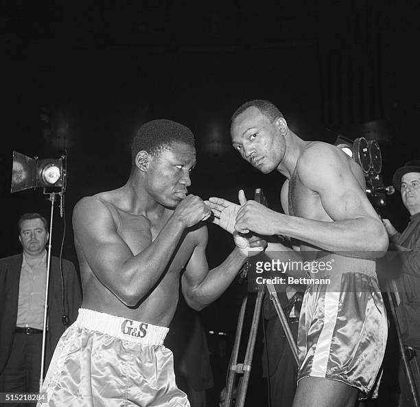New York, NY- World light-heavyweight champion Dick Tiger and challenger Bob Foster square of during weigh-in for their May 24th title bout at...