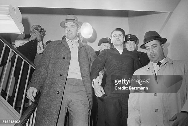 Confessed Boston Strangler Albert DeSalvo is led from a press conference at the Lynn police station after his capture in a West Lynn uniform store....