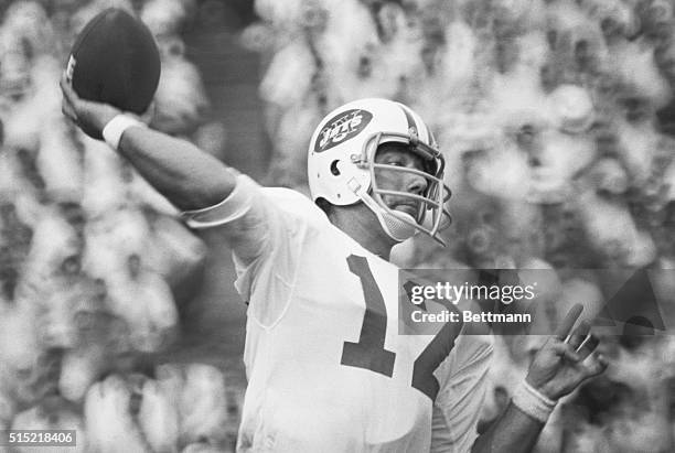 New York Jets quarterback Joe Namath throws the football during a game against the Giants in New Haven.