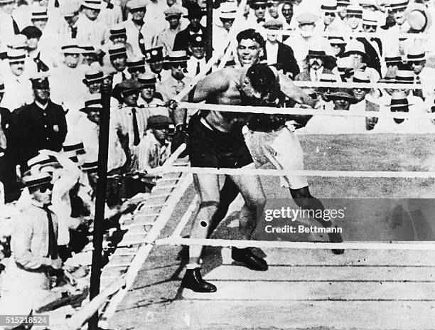 Jack Dempsey fights Jess Willard to eventually win the heavyweight title.