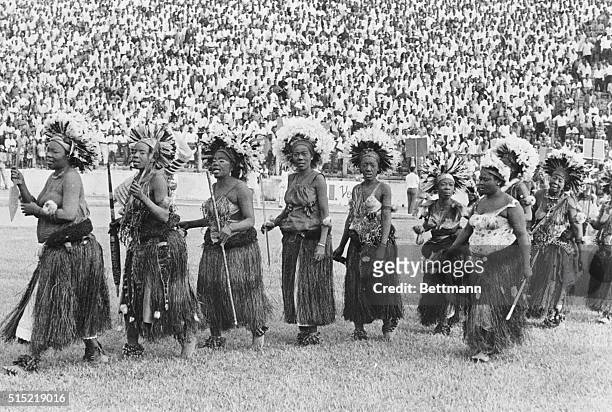 Leopoldville, Congo- Congolese women dancers enter the arena of the Baudouin Stadium here July 1st for a display of dancing, the festivities were in...