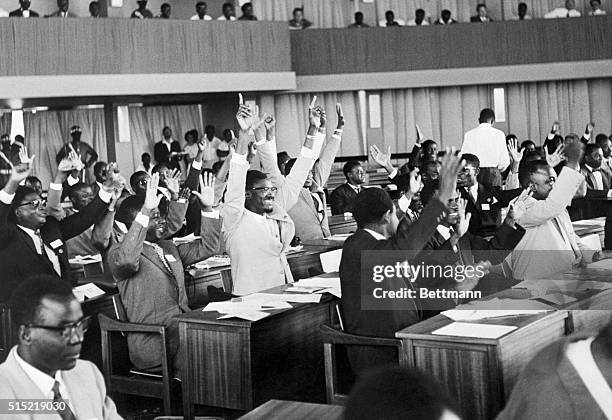 Leopoldville, The Congo- New Congo Premier Patrice Lumumba, , is among the deputies in the Congolese Parliament chamber cheering as Joseph Kasongo is...