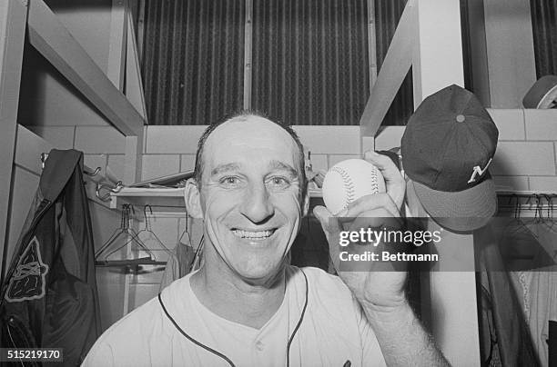 Milwaukee, WI- Milwaukee Braves lefthander Warren Spahn has big, happy grin on his face as he shows the ball he used to strike out Los Angeles...