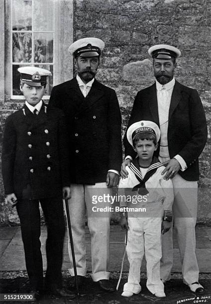 King Edward VIII and Nicholas II, Emperor of Russia, stand with their sons, Prince George V and Czarevitch Alexei, respectively, at Cowes, England.