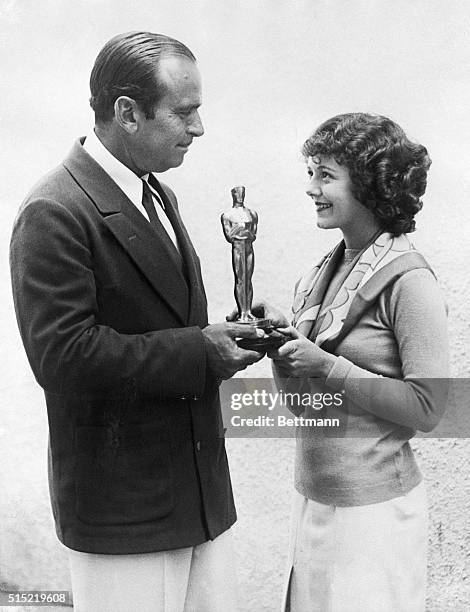 Douglas Fairbanks presents Janet Gaynor with the first Academy Award for Best Actress, for her work in Seventh Heaven, as well as Street Angel, and...