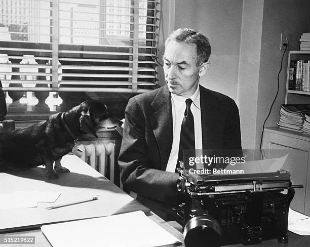Portrait of E.B. White at work for The New Yorker Magazine. Photograph circa 1955.
