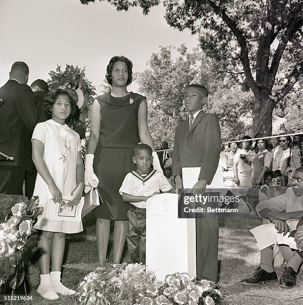 Arlington, VA: The widow of Medgar Evers joined over 2,000 delegates to the NAACP convention in Washington in a pilgrimmage to his grave in Arlington...