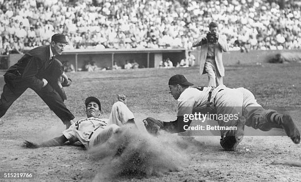 Cleveland, Ohio- Chicago White Sox catcher Sherman Lollar lunges for Cleveland Indians Bob Avila, tagging him out as Avila attempts to come home from...