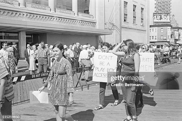 Atlantic City, NJ-Demonstrators picketing the Miss America Pageant take a break as they await the hour when the new Miss America will be named. A...