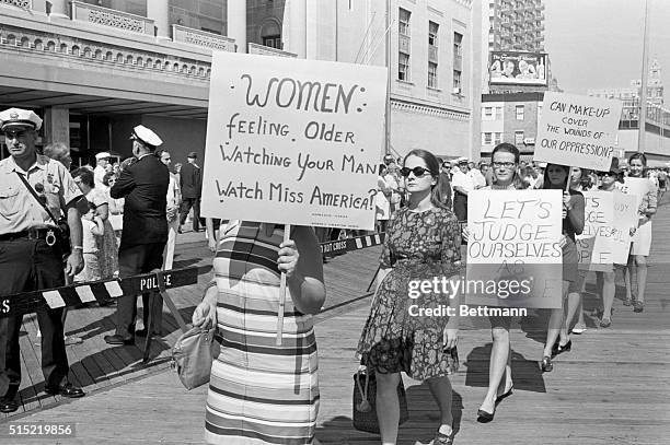 Atlantic City, NJ-Demonstrators picketing the Miss America Pageant are shown as they await the hour when the new Miss America will be named. A group...