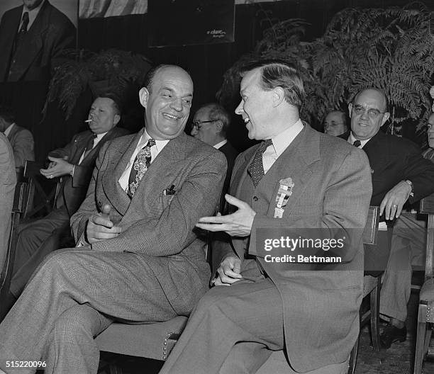 Chicago, Illinois- Joe Curran , right-wing leader of the CIO National Maritime Union, talks with another top CIO man, Walter Reuther of the United...