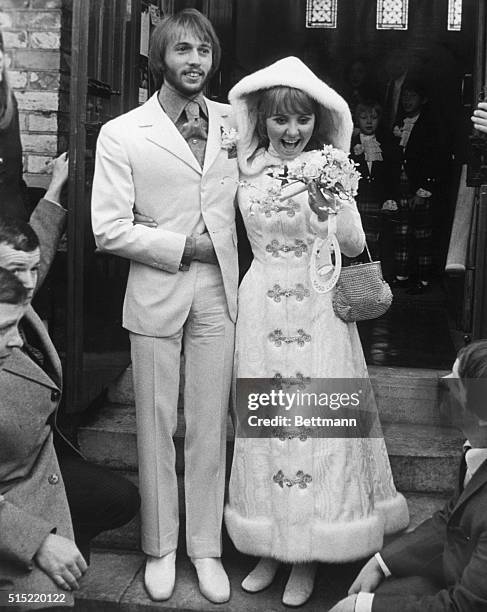 Gerrards Cross, England-Pop singer Lulu and Australian singer Maurice Gibb of the Bee Gees pop group, leave the parish church following their...